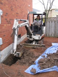 Image of machine excavating a foundation