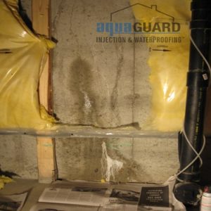 Leaking poured concrete foundation crack