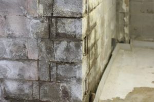 Leaking concrete block wall