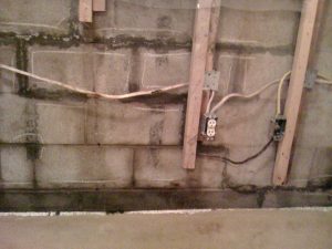 Leaking concrete block foundation wall