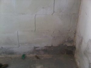Step cracking in cinder-block foundation wall