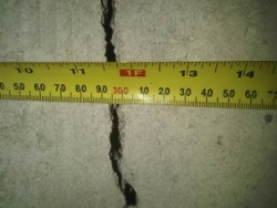 1 cm wide foundation structural crack